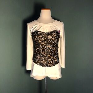 Nude and black Bustier /Corset , by poof shown over a shirt